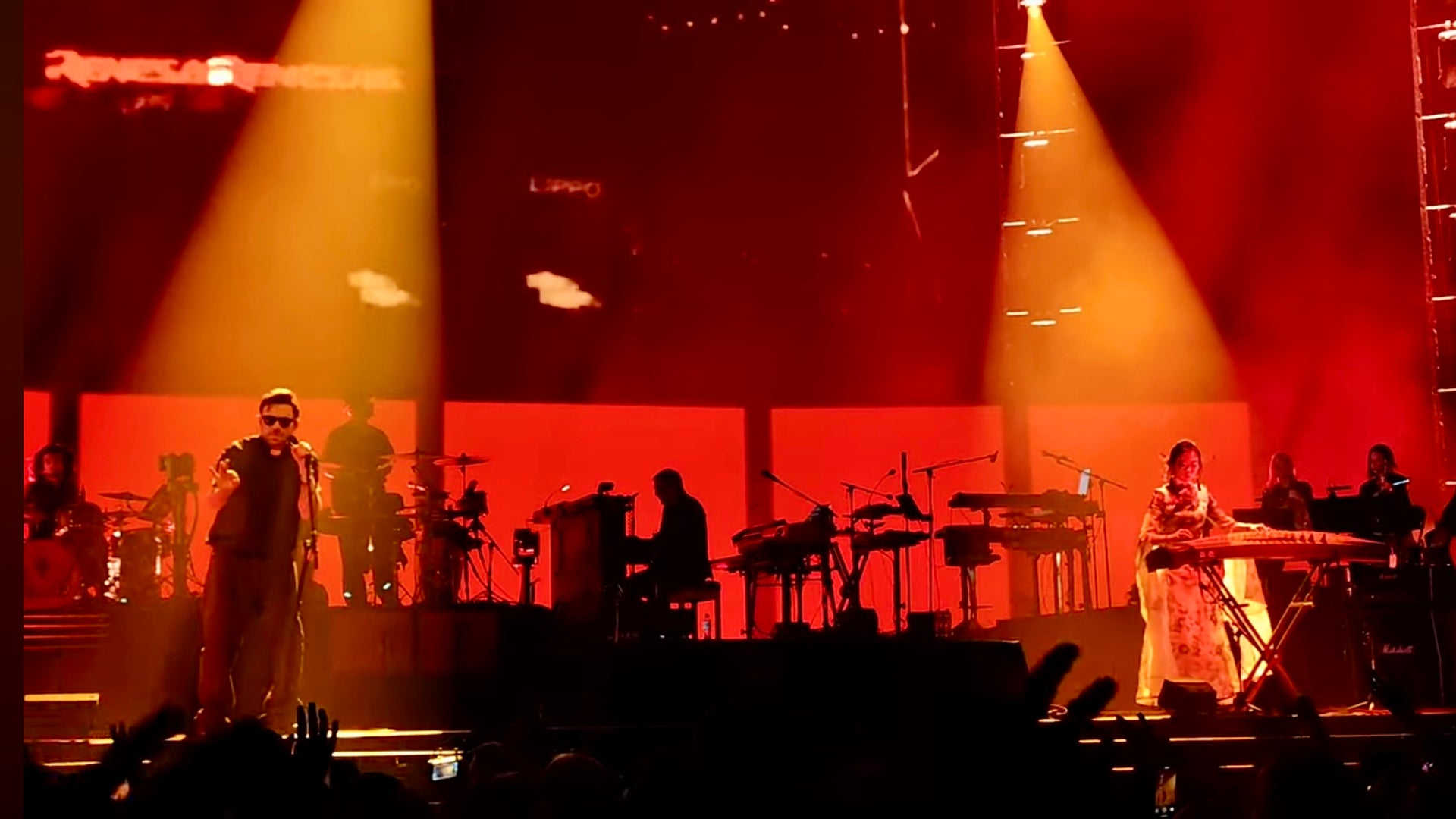 Load video: Famous guzheng player Qing Du performed live with Damon Albarn, Gorillaz in London. She beautifully closed the show with dreamlike and mesmerising sound from Guzheng!