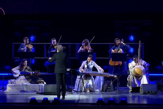 Qing Du collaborating with musicians from Chinese, Middle Eastern, Indian and Mediterranean traditions during World Expo Dubai, exploring cultural dialogue through music.