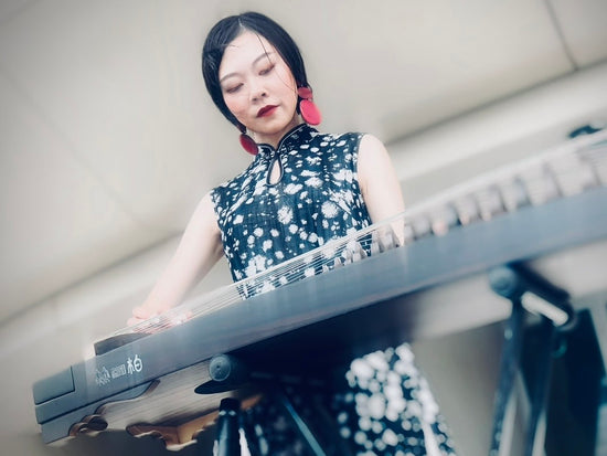 Qing Du, founder of Guzheng World, guzheng artist, educator and specialist helping players around the world discover, learn and choose the right guzheng.