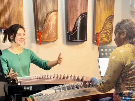 Qing Du supporting guzheng students from different countries and backgrounds through personalised guidance, lessons and instrument recommendations.