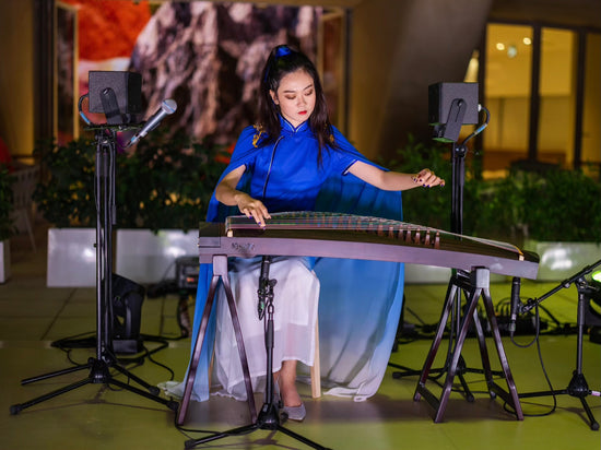 International guzheng performer Qing Du presenting Chinese music to audiences across the UK, Europe and beyond.